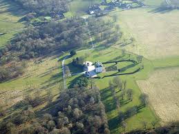 Ashdown House from the air, the Uffington, White Horse is on a hill about 3 miles to the right